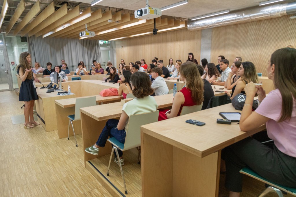 A speaker leading a workshop session in a lecture hall at EUSAF 2026